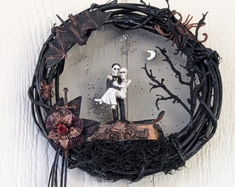 10" Black Halloween wreath with newlywed skeleton couple in night scene.