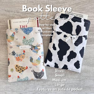 May include: Two fabric book sleeves with an outside pocket. One sleeve features a cream background with a multi-coloured chicken pattern. The other sleeve has a black and white cow print pattern with a small white bow. Text includes Book Sleeve pattern, Step-by-step written instructions, no template, Sizes: Small, Medium, Large, Features an outside pocket.