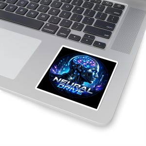 May include: A square sticker with a futuristic design. It features a human head profile with a glowing brain and the words "NEURAL DRIVE" in blue. The background is dark with blue and purple accents. The sticker is on a laptop.
