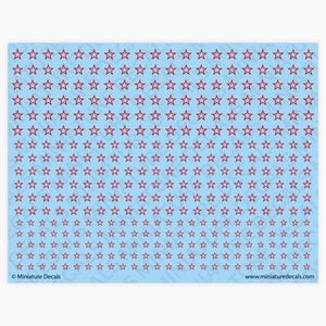 May include: A sheet of miniature decals with a repeating pattern of red outline stars on a light blue background. The text "Miniature Decals" and "www.miniaturedecals.com" are visible at the bottom.