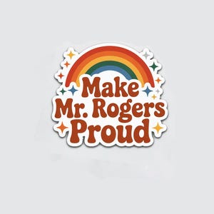 K&ouml;nnte beinhalten: Ein Aufkleber mit einem Regenbogen-Design und dem Text "Make Mr. Rogers Proud" in braunen Buchstaben im Retro-Stil. Der Regenbogen hat rote, orange, gelbe, gr&uuml;ne und blaue B&ouml;gen. Dekorative Sternausbr&uuml;che in verschiedenen Farben umgeben den Text und den Regenbogen.