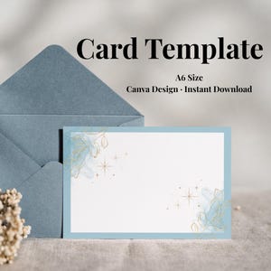 May include: A6 size card template with a blue border and watercolor floral design. The card is accompanied by a matching envelope. Text on the card reads "Card Template" and "Canva Design - Instant Download".