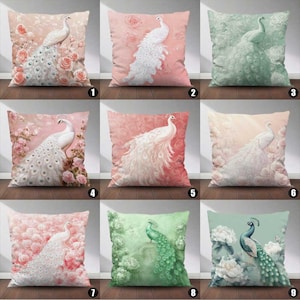 May include: Decorative throw pillows featuring peacock designs. Each pillow showcases a different peacock illustration against a floral background. The pillows come in various colors, including pink, green, and blue, with white peacocks.