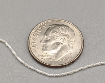 Smallest Pearls in the World - Japanese Akoya Keshi Seed Pearls 1 mm or less  Seed Pearls Top Quality AAA Between 850-900 Pearls per Strand