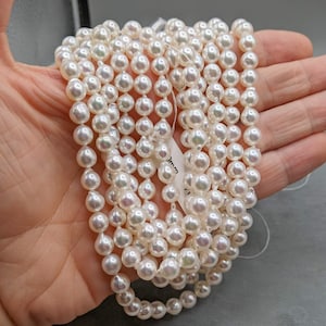 Japanese Akoya Cultured Pearl Strand - Very Baroque Super Luster - Off-White Color - 16 Inches - 45 or More Pearls Per Strand - 7-7.5 mm