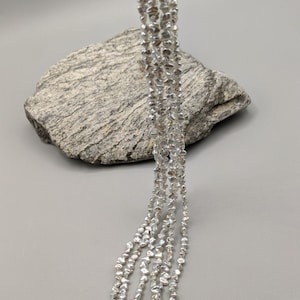 Keshi Pearls - AAA Quality Japanese Pearls  Akoya Saltwater Strands - Natural Color Off White Silver 16 Strand
