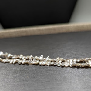 Larger Japanese Akoya Saltwater ‘Stick’ Keshi Pearl Strand - Seed Pearls Lot AAA Quality Over 100 Pearls Per Strand Lots of Overtone  Colors