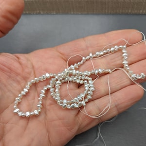 Larger Japanese Akoya Saltwater Keshi Pearl Strand -Seed Pearls Lot AAA Quality Over 120 Pearls Per Strand - Lots of Overtone Colors
