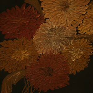 May include: Close-up of a painting featuring a cluster of textured flowers in shades of orange, yellow, and red against a dark background. The brushstrokes are visible, creating a three-dimensional effect.