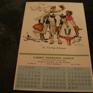 May include: Vintage calendar print featuring a color illustration of a man and woman with a cow, geese, and the text "the Traveling Salesman." The calendar includes the Larsen Insurance Agency logo and a January-March calendar.