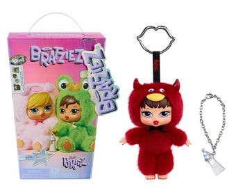 Peluche original Bratz Bratziez Iconz Series en caja sorpresa con accesorio de clip para dije. Juguete coleccionable.