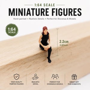 May include: A 1:64 scale miniature figure of a person with reddish-brown hair wearing a black sleeveless dress and black stockings. The figure is seated and measures 0.87 inches in height as indicated by the text and measurement graphic.