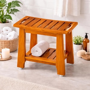 May include: A white ceramic mug with a black handle and the text "But First, Coffee" in a black, bold font. The mug is sitting on a white surface.