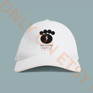 May include: A white ceramic mug with a black handle and the text "But First, Coffee" in a handwritten style. The mug is on a white surface. The mug is approximately 4 inches tall.