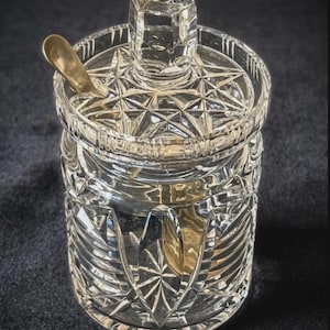 Bocal de conserve vintage en cristal taillé avec couvercle en étoile, cuillère en métal argenté, pot de confiture