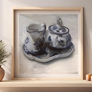 May include: A framed painting of a blue and white porcelain creamer and sugar bowl on a tray. The painting is set against a white background.