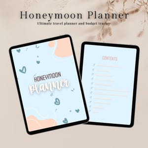 May include: Two digital tablets displaying a honeymoon planner. The first tablet shows a light blue background with peach-colored shapes, hearts, and the words "Honeymoon Planner." The second tablet displays a contents page.