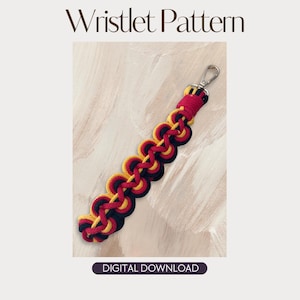 May include: A macrame wristlet featuring a repeating knotted pattern in black, red, and yellow cord. The wristlet is attached to a silver-colored metal lobster clasp. The text Wristlet Pattern and DIGITAL DOWNLOAD are visible in the image.