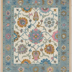 May include: Rectangular rug with a cream-colored center featuring a floral pattern in shades of pink, blue, and gold. The rug has a light blue border with floral and geometric designs. The rug has a beige fringe.