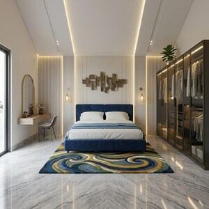 May include: A modern bedroom featuring a navy blue bed with white bedding and a patterned rug in shades of blue, green, and yellow. A large wardrobe with glass doors is on the right, and a vanity with a mirror is on the left.