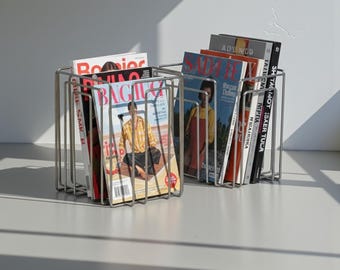 Willi Glaeser | magazine newspaper rack set of 2 | for thomas merlo & partners ag | chrome plated steel | 1989 | swiss modernist | vintage