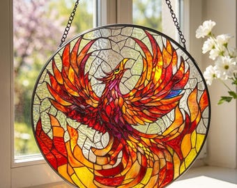Acchiappasole in vetro colorato a forma di fenice: decorazione per finestre con uccello mitologico e uccello di fuoco nascente.