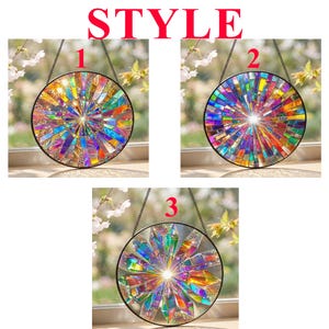 May include: Three circular suncatchers labeled STYLE 1, 2, and 3. Each features a radial mosaic pattern of iridescent, multi-colored glass shards arranged in a sunburst design, suspended by a thin black metal chain against a window.