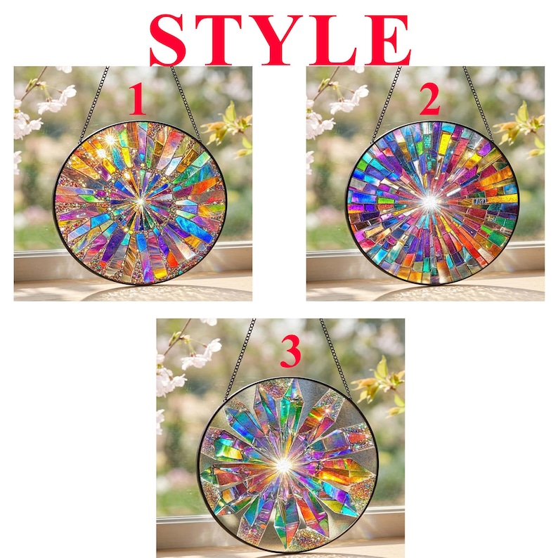 May include: Three circular suncatchers labeled STYLE 1, 2, and 3. Each features a radial mosaic pattern of iridescent, multi-colored glass shards arranged in a sunburst design, suspended by a thin black metal chain against a window.
