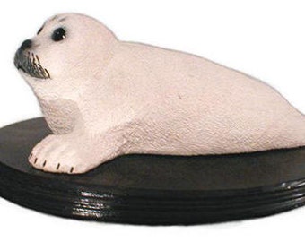 Escultura de cachorro de foca arpa bebé de 12 x 4 pulgadas.