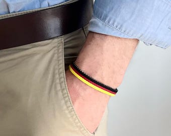 Pulsera de aficionado de Alemania en negro, rojo y dorado, pulsera de tela con cierre de acero inoxidable, regalo de joyería para aficionados al fútbol.
