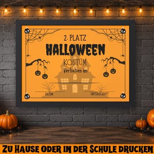 May include: A framed Halloween award certificate with orange and black text and graphics. The certificate reads "2nd Place Halloween Costume" and includes space for a date and signature. Pumpkins and candles decorate the scene.