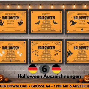 May include: Six Halloween award certificates with black frames, featuring orange backgrounds and spooky graphics. Each certificate has German text and Halloween-themed illustrations like bats, ghosts, and witch hats. The awards are for costume contests.