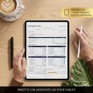 May include: A digital ADHD budget tracker displayed on a tablet screen, featuring sections for income streams, expense categories, savings, and debt payoff. The interface includes text fields for monthly financial data, totals, and balance summaries.
