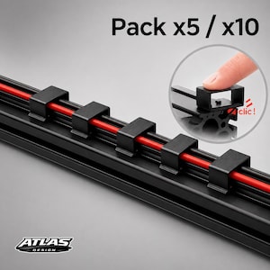 Op de afbeelding: Zwarte kabelorganizers met rode draden. De afbeelding toont een close-up van de organizers, met de tekst "Pack x5 / x10" bovenaan. Het woord "clic!" is ook zichtbaar. Het logo "ATLAS DESIGN" staat onderaan.