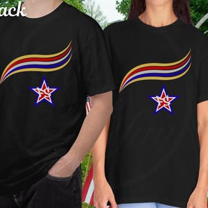May include: Black t-shirts with a colorful design. The design includes a curved stripe in yellow, red, and blue above a star with a red outline and a blue center. The word "Black" is in the top left corner.