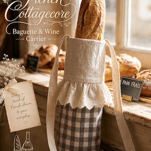 May include: A fabric carrier for a baguette or wine bottle featuring a grey and white checkered pattern on the lower section, a solid cream-colored upper section, and a decorative white eyelet lace trim around the middle with two long straps.