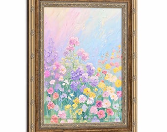 Cuadro en lienzo enmarcado con pintura al óleo de flores silvestres en tonos pastel. Decoración de pared de estilo impresionista con flores coloridas, prados y ambiente campestre.