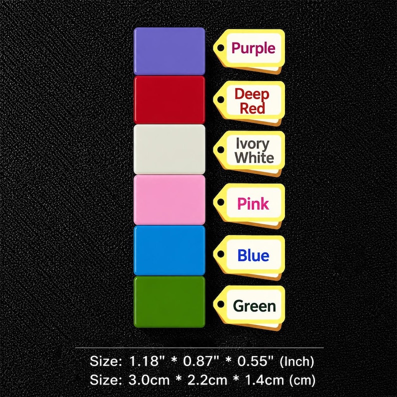 Puede incluir: Una colecci&oacute;n de etiquetas rectangulares de colores: morado, rojo intenso, blanco marfil, rosa, azul y verde. Cada etiqueta tiene una etiqueta con su color. Dimensiones: 3,0 cm x 2,2 cm x 1,4 cm.