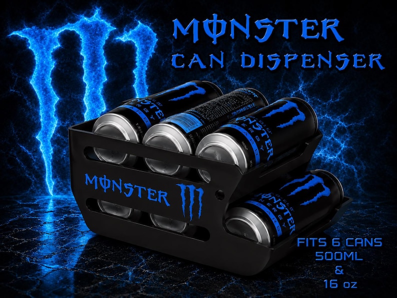 May include: A black Monster can dispenser featuring the blue Monster logo and text. The unit holds six cans, with text stating it fits 500ml and 16 oz cans. The dispenser has a tiered design with cutouts, displaying black and blue energy drink cans.