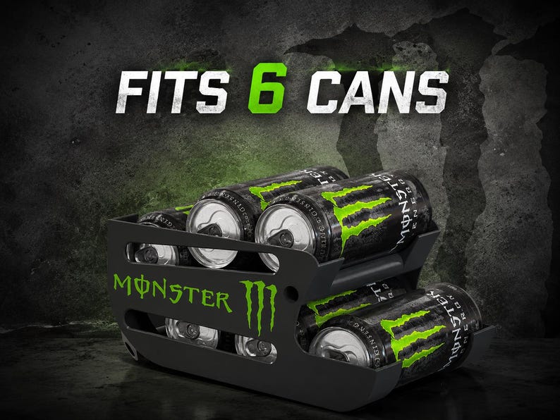 May include: A black metal beverage can dispenser rack featuring the green Monster Energy logo on the side. The rack holds six black and green Monster Energy cans arranged in two rows. The text FITS 6 CANS is displayed in white and green above the rack.