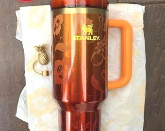The Stanley 1913 x KAROL G 40 oz Quencher H2.O FlowState Tumbler.