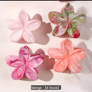 Puede incluir: Cuatro pinzas para el cabello con forma de flor. Una es de color rosa claro s&oacute;lido, mientras que las otras presentan patrones jaspeados en rosa y blanco, verde y rosa, y melocot&oacute;n y blanco. Cada pinza tiene cinco p&eacute;talos y un acabado brillante. Texto: Menge: 【4 St&uuml;ck】.