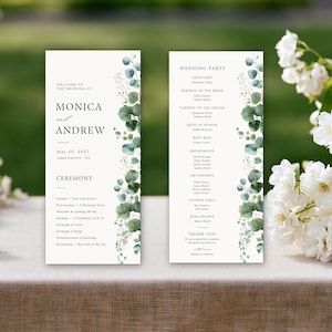 Puede incluir: Dos programas de ceremonia de boda verticales sobre cartulina blanca con texto negro en fuente serif e ilustraciones de hojas de eucalipto en acuarela en los bordes derechos. La tarjeta izquierda muestra a Monica y Andrew.