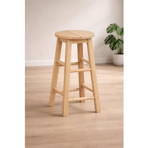 May include: A light-colored wooden bar stool with a round seat and three supporting rungs. The stool has four legs and is made of natural wood. The stool is approximately 30 inches tall.