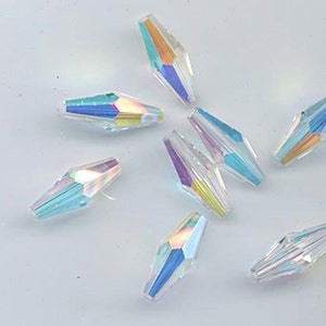 Twelve vintage Swarovski crystal beads - Art. 5205 - 15 x 6 mm - crystal aurora borealis