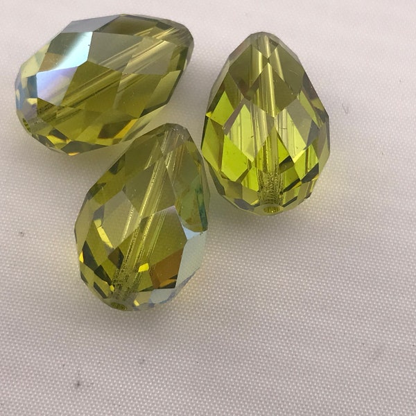 Four vintage Swarovski crystal beads - Art. 5500 - 18 x 12 mm - light olivine AB