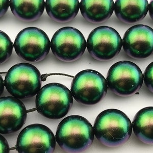 Ten gorgeous Swarovski pearls - 5810 - 10 mm - crystal scarabaeus green pearl