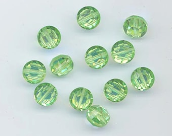 Twelve beautiful vintage Swarovski crystals - art 5100 - 8mm - peridot aurora borealis