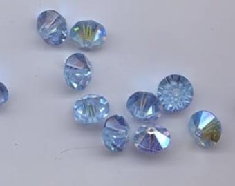 Twelve rare vintage Swarovski crystal beads: Art. 42/5307 - 10 mm - aqua AB
