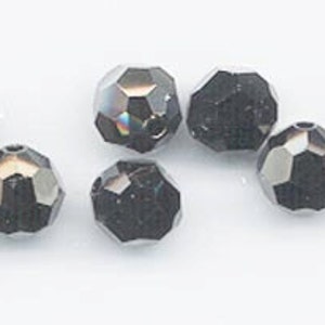 Twelve vintage Swarovski crystals: art 5000 - 8mm - jet nut